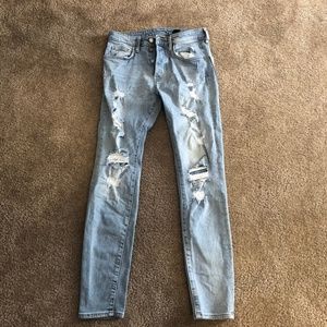 Light Washed Ripped Jeans